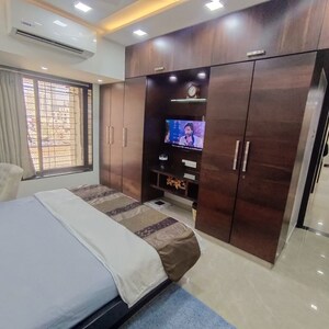 Bedroom in 2 BHK Apartment at Evershine Embassy, Andheri West – for Rent