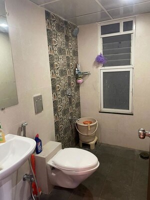 Bathroom in 2 BHK Apartment at Ace Augusta, Hinjewadi – for Rent