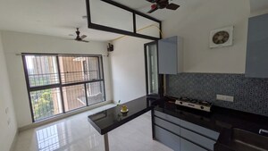 Living Room in 1 BHK Apartment at Lodha Crown Quality Homes, Majiwada – for Rent