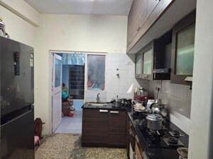 Kitchen in 3 BHK Apartment at High Point Apartments, Palace Road – for Sale