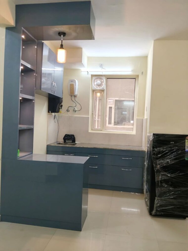 Kitchen, pyramid-midtown 2 Bedroom 850 Sq.Ft. Apartment In Sector 59 Gurgaon 10217050