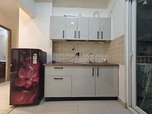 Kitchen in 3 BHK Apartment at Mahagun Moderne, Sector 78 – for Sale