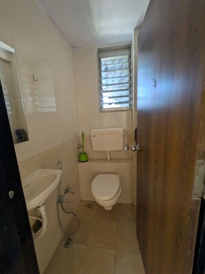 Bathroom in 1 BHK Apartment at Koldongri CHS, Andheri East – for Rent