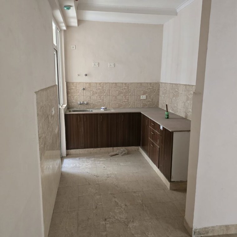 Kitchen, amrapali-golf-homes 3 Bedroom 1115 Sq.Ft. Apartment In Sector 4 Greater Noida Greater Noida 10217156