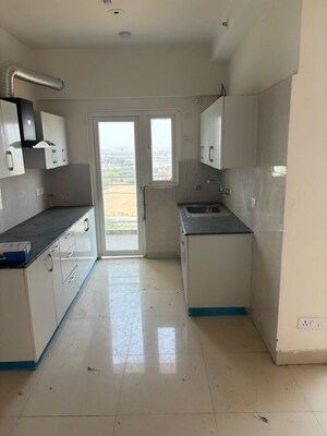 Kitchen in 2 BHK Apartment at Eldeco Live By The Greens, Sector 150 – for Rent