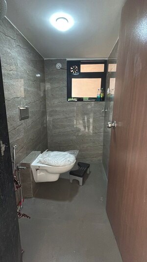 Bathroom in 1 BHK Apartment at Runwal Gardens, Dombivli East – for Rent