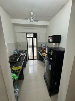 Kitchen in 1 BHK Apartment at Runwal My City, Dombivli East – for Rent