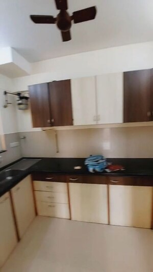 Kitchen in 2 BHK Apartment at Hiranandani Woodrose, Manpada – for Rent