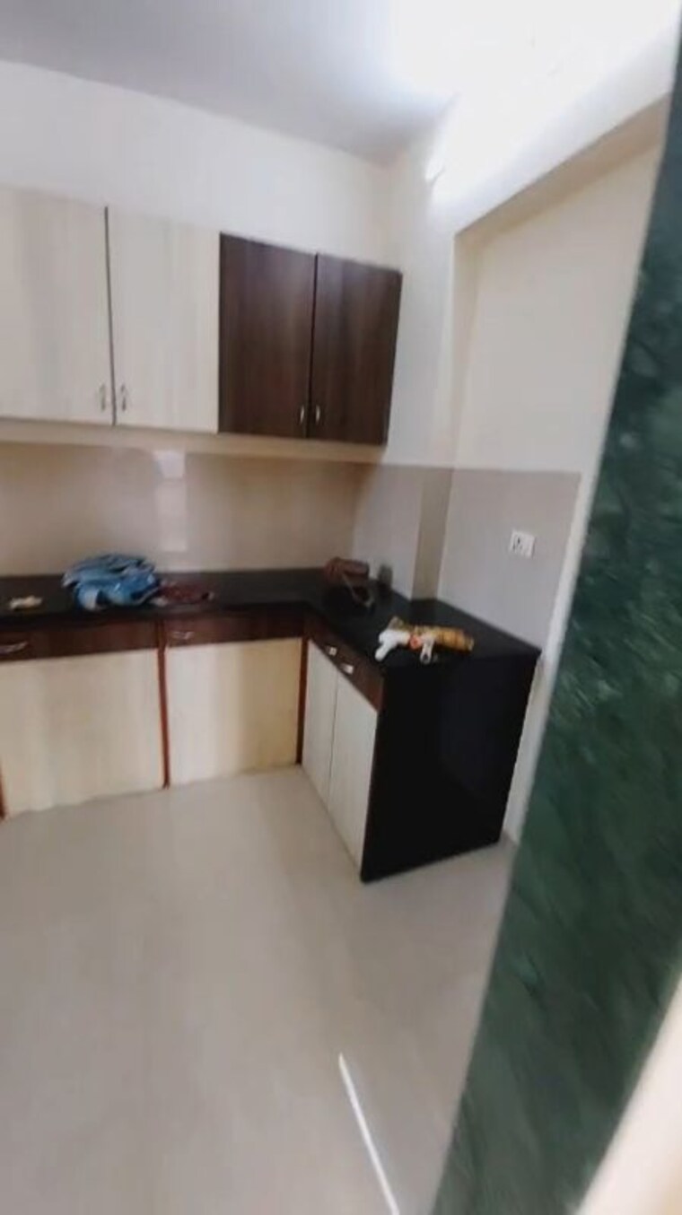 Kitchen, hiranandani-woodrose 2 Bedroom 999 Sq.Ft. Apartment In Manpada Thane 10217289