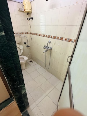 Bathroom in 2 BHK Apartment at Triveni CHS Malad West, Malad West – for Rent