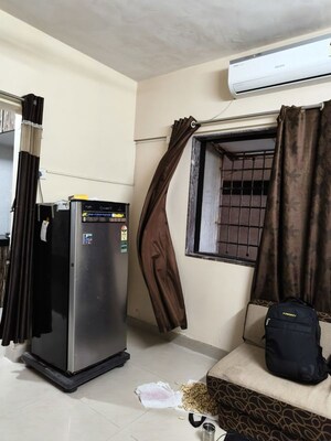 Living Room in 1 BHK Apartment at Sai Milan CHS, Worli – for Rent