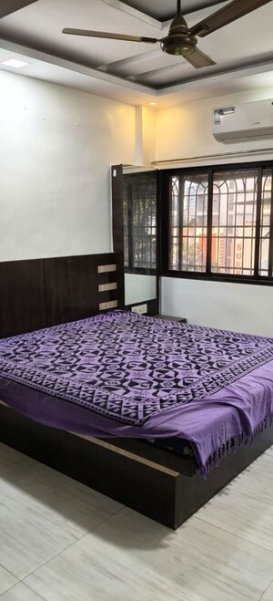 Bedroom in 2 BHK Apartment at Om Balaji Kripa CHS, Nerul Sector 19 – for Rent