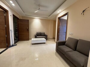 Living Room in 2 BHK Apartment at Palm Residency Chhatarpur, Chattarpur – for Rent