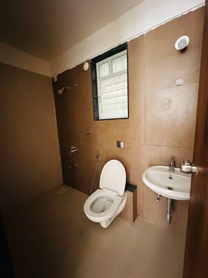 Bathroom in 2 BHK Apartment at AUM Miravet District, Ravet – for Rent