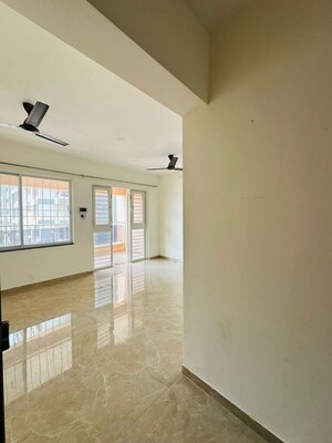 Living Room in 2 BHK Apartment at AUM Miravet District, Ravet – for Rent