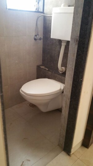 Bathroom in 2 BHK Apartment at Raj Exotica, Mira Road – for Sale