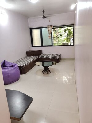 Living Room in 1 BHK Apartment at Koregaon Park CHS, Koregaon Park – for Rent