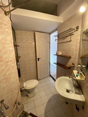 Bathroom in 2 BHK Apartment at Hiranandani Gardens Birchwood, Powai – for Rent