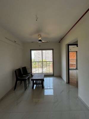 Living Room in 1 BHK Apartment at Puranik City, Kasarvadavali – for Sale