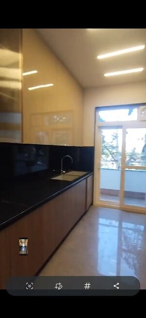 Kitchen in 4 BHK Builder Floor at Sushant Lok I – for Sale