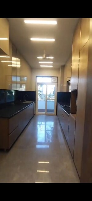 Kitchen in 4 BHK Builder Floor at Sushant Lok I – for Sale