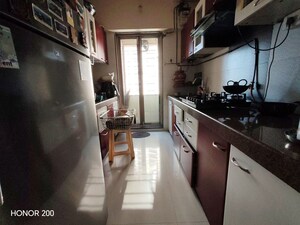 Kitchen in 3.5 BHK Apartment at Prakruti Pearl, Ghodbunder Road – for Rent