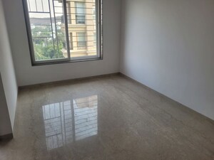 Bedroom in 4 BHK Apartment at Dharmesh Apartment, Shivajinagar – for Sale