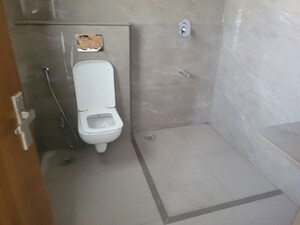 Bathroom in 4 BHK Apartment at Dharmesh Apartment, Shivajinagar – for Sale