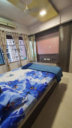 Bedroom in 2 BHK Apartment at Shree Sumukh Heights, Oshiwara – for Rent