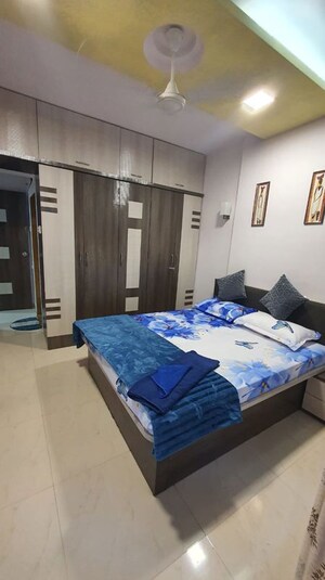 Bedroom in 2 BHK Apartment at Shree Sumukh Heights, Oshiwara – for Rent