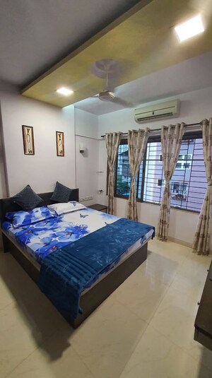 Bedroom in 2 BHK Apartment at Shree Sumukh Heights, Oshiwara – for Rent