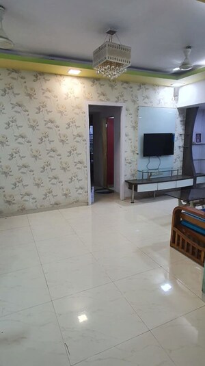 Living Room in 2 BHK Apartment at Shree Sumukh Heights, Oshiwara – for Rent