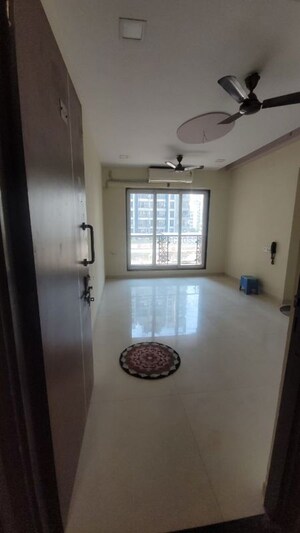 Living Room in 1 BHK Apartment at JK Iris, Mira Road – for Rent