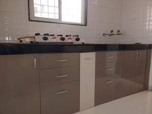 Kitchen in 2 BHK Apartment at Waghere Rajveer Nucleus, Wakad – for Rent