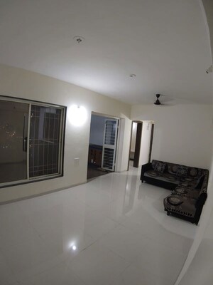 Living Room in 2 BHK Apartment at Waghere Rajveer Nucleus, Wakad – for Rent