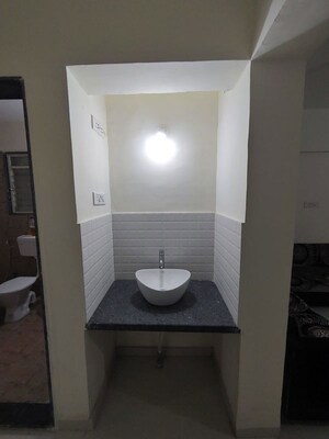 Bathroom in 2 BHK Apartment at Waghere Rajveer Nucleus, Wakad – for Rent