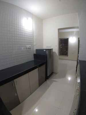 Kitchen in 2 BHK Apartment at Waghere Rajveer Nucleus, Wakad – for Rent