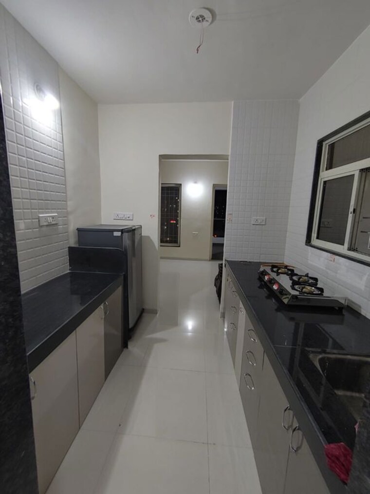 Kitchen, waghere-rajveer-nucleus 2 Bedroom 1072 Sq.Ft. Apartment In Wakad Pune 10217875