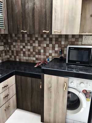 Kitchen in 2 BHK Apartment at Swiss Corner, Andheri West – for Rent