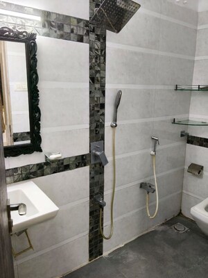Bathroom in 2 BHK Apartment at Swiss Corner, Andheri West – for Rent