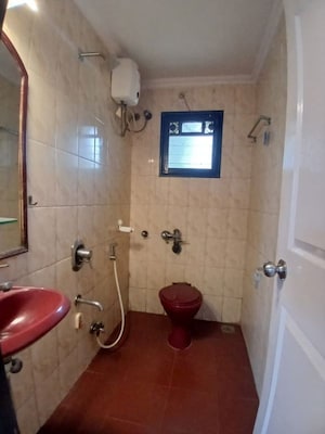 Bathroom in 2 BHK Apartment at Creek Crest CHS, Andheri West – for Rent