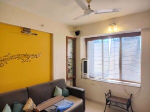 Living Room in 2 BHK Apartment at Metropolis Rivera, Kasarvadavali – for Rent