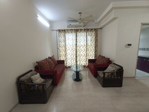 Living Room in 2 BHK Apartment at Metro The Palms, Nerul – for Rent