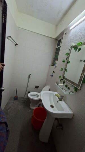 Bathroom in 2 BHK Apartment at Ashapura Hill View, Pisoli – for Rent