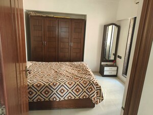 Bedroom in 2 BHK Apartment at Swastik Regalia, Waghbil – for Rent