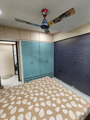 Bedroom in 2 BHK Apartment at Arkade Bhoomi Heights, Kandivali West – for Rent