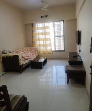 Living Room in 2 BHK Apartment at Hiranandani Paloma, Ghodbunder Road – for Rent