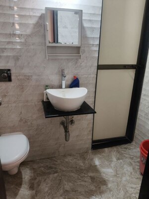 Bathroom in 2 BHK Apartment at Hiranandani Paloma, Ghodbunder Road – for Rent