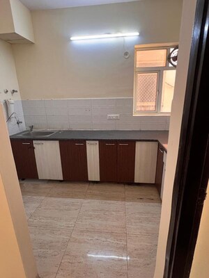 Kitchen in 3 BHK Apartment at Landcraft Golflinks Plaza, Pandav Nagar – for Rent