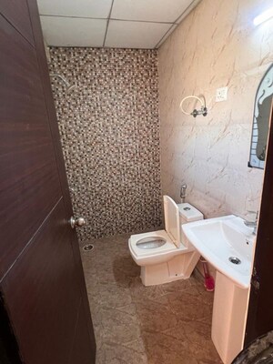 Bathroom in 3 BHK Apartment at Landcraft Golflinks Plaza, Pandav Nagar – for Rent